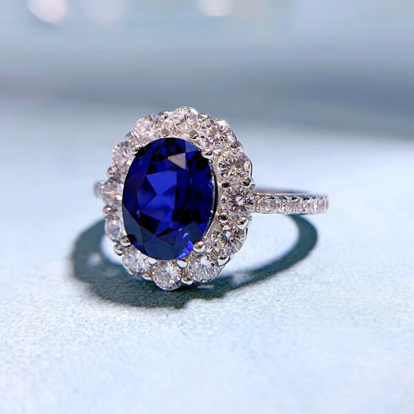 Bague en argent rhodié 925 serti de saphir artificiel ovale 7*9 et incrustées de zircons – Image 2